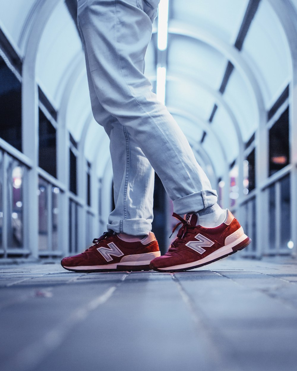 Person wearing pair of red New Balance low-top sneakers photo – Free Nike  Image on Unsplash