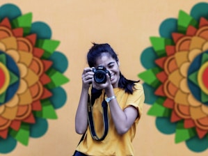 woman holdingcamera