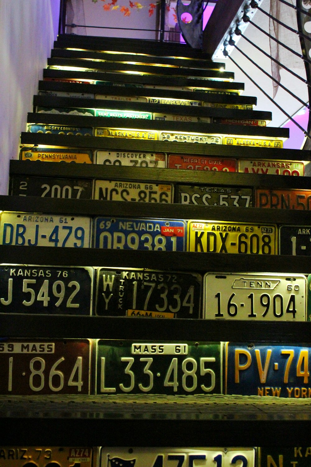 staircase with plate numbers as decoration