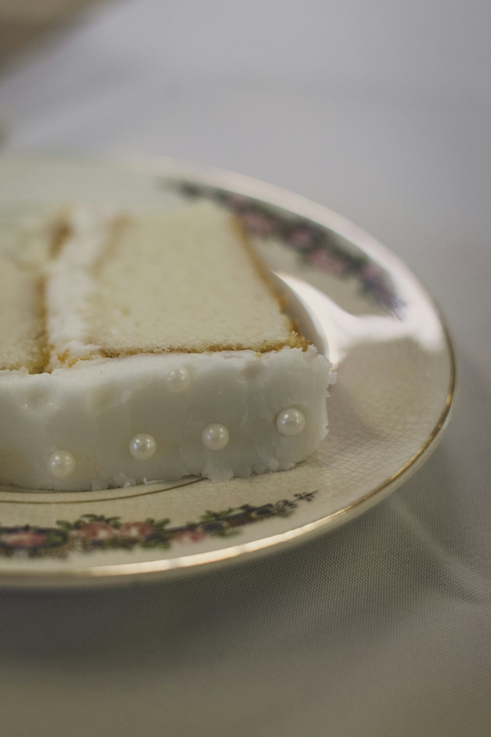 sliced of cake on white saucer