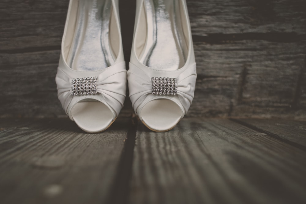 pair of women's grey peep-toe shoes