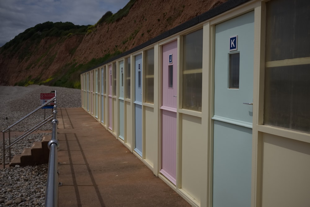 beige and pink wooden house