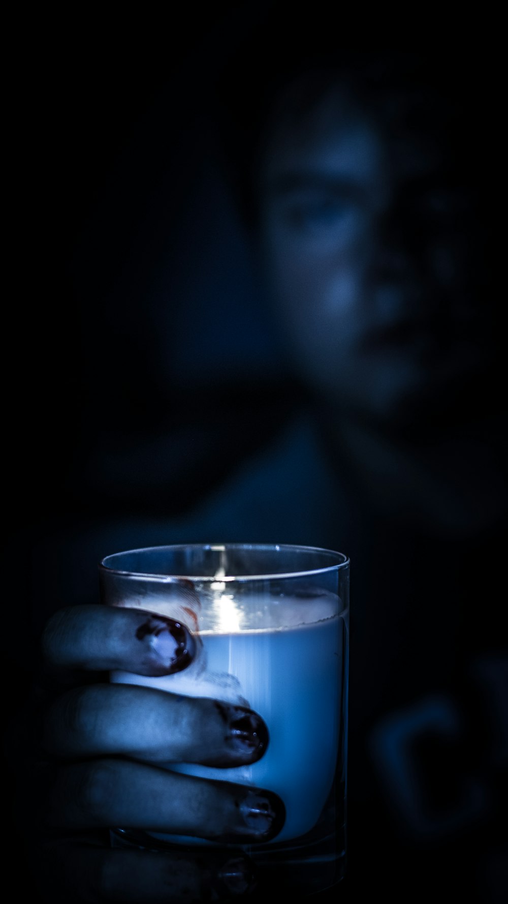 man holding glass