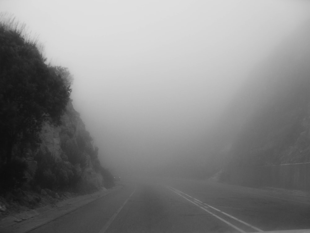 wide road on foggy weather
