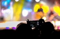 An engaging image of a K-pop concert with colorful lights.