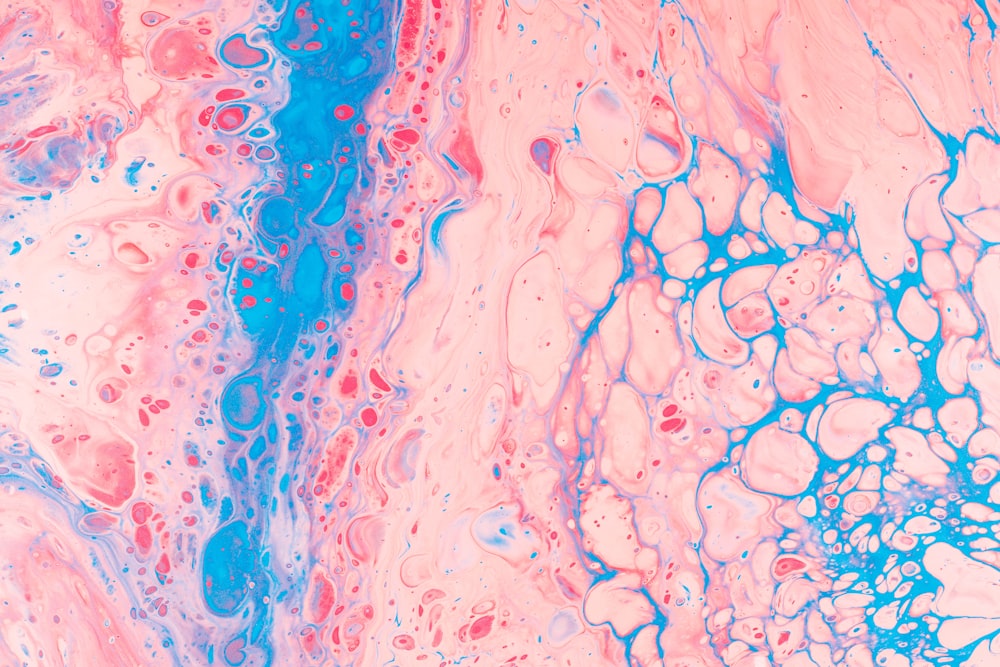 Illustration von blauen und rosa Partikeln