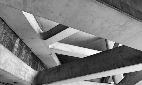 a black and white photo of a concrete structure