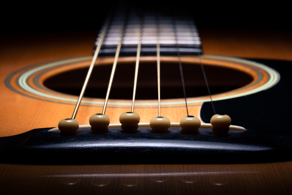 brown and black guitar