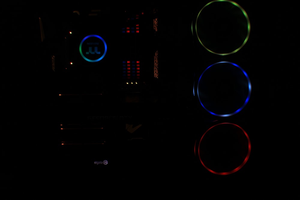 a close up of a car dashboard light in the dark