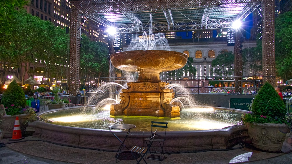 round gray water fountain