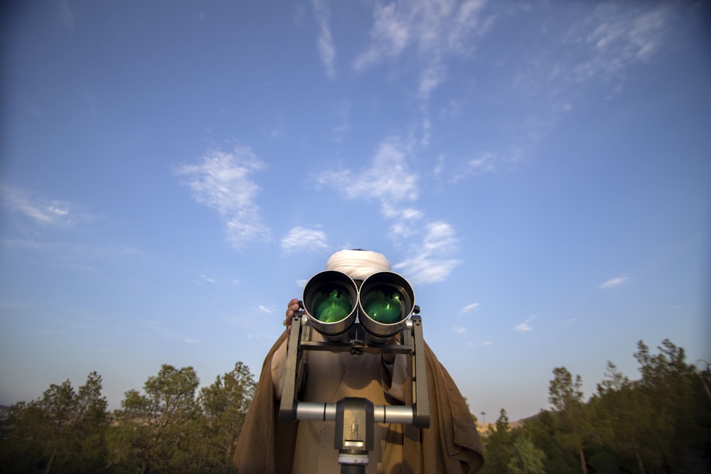 brown and grey binoculars