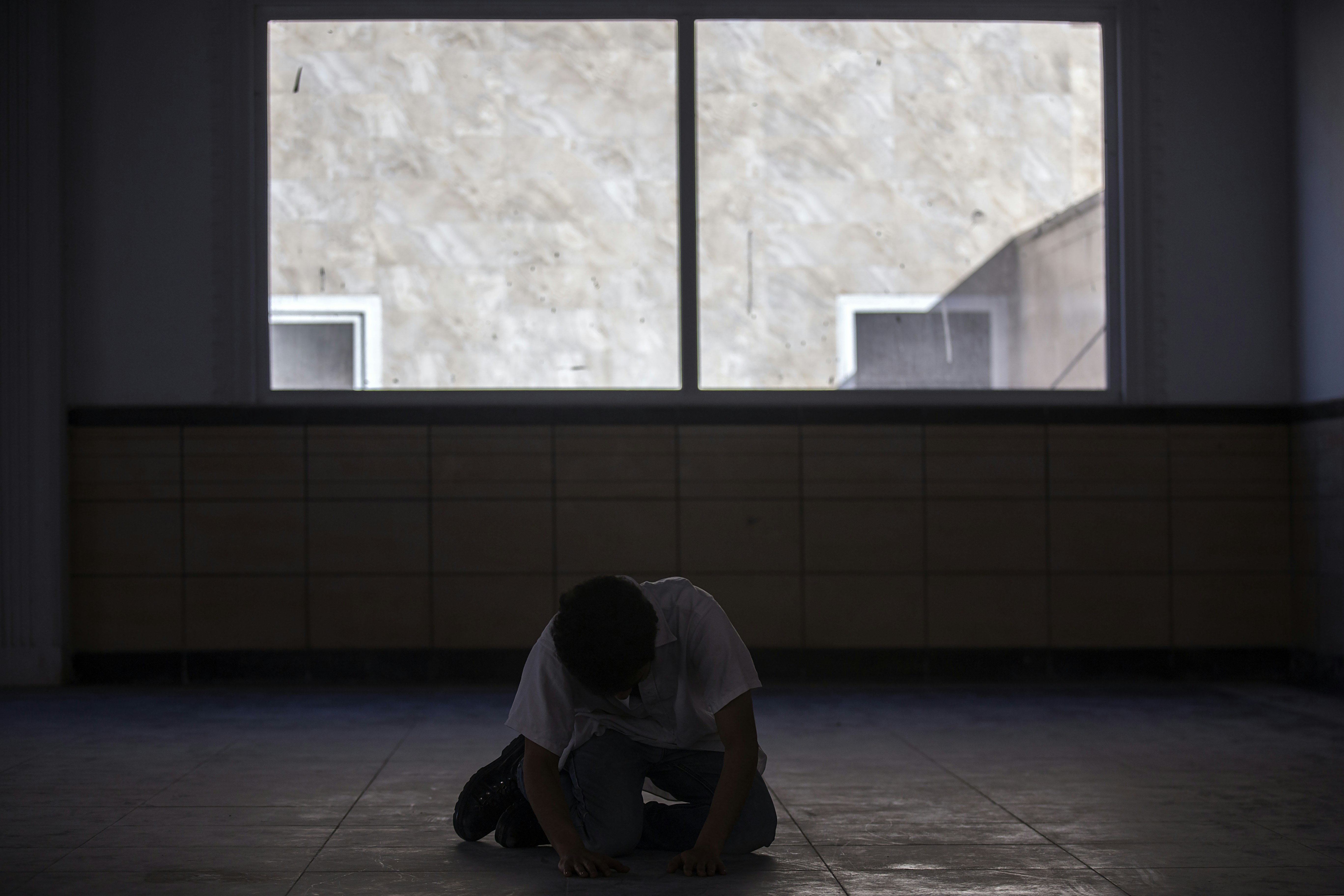 woman sitting inside room