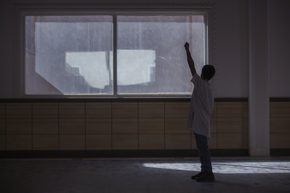 man standing inside room