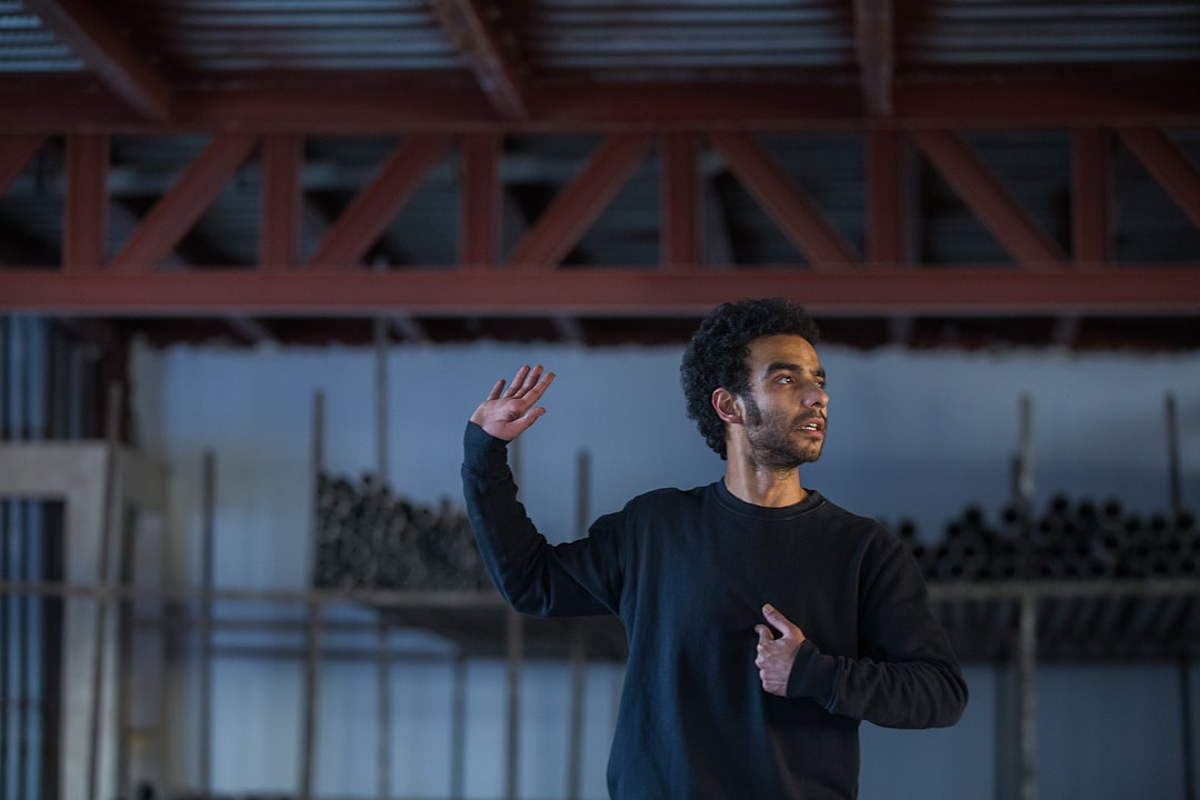 man wearing black sweatshirt