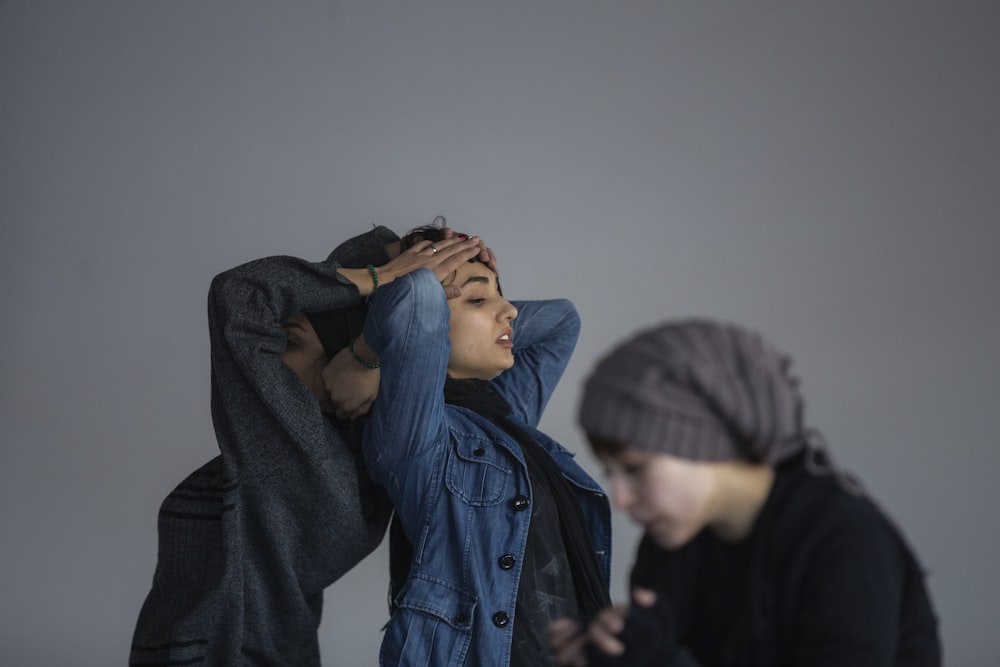 two women performing drama