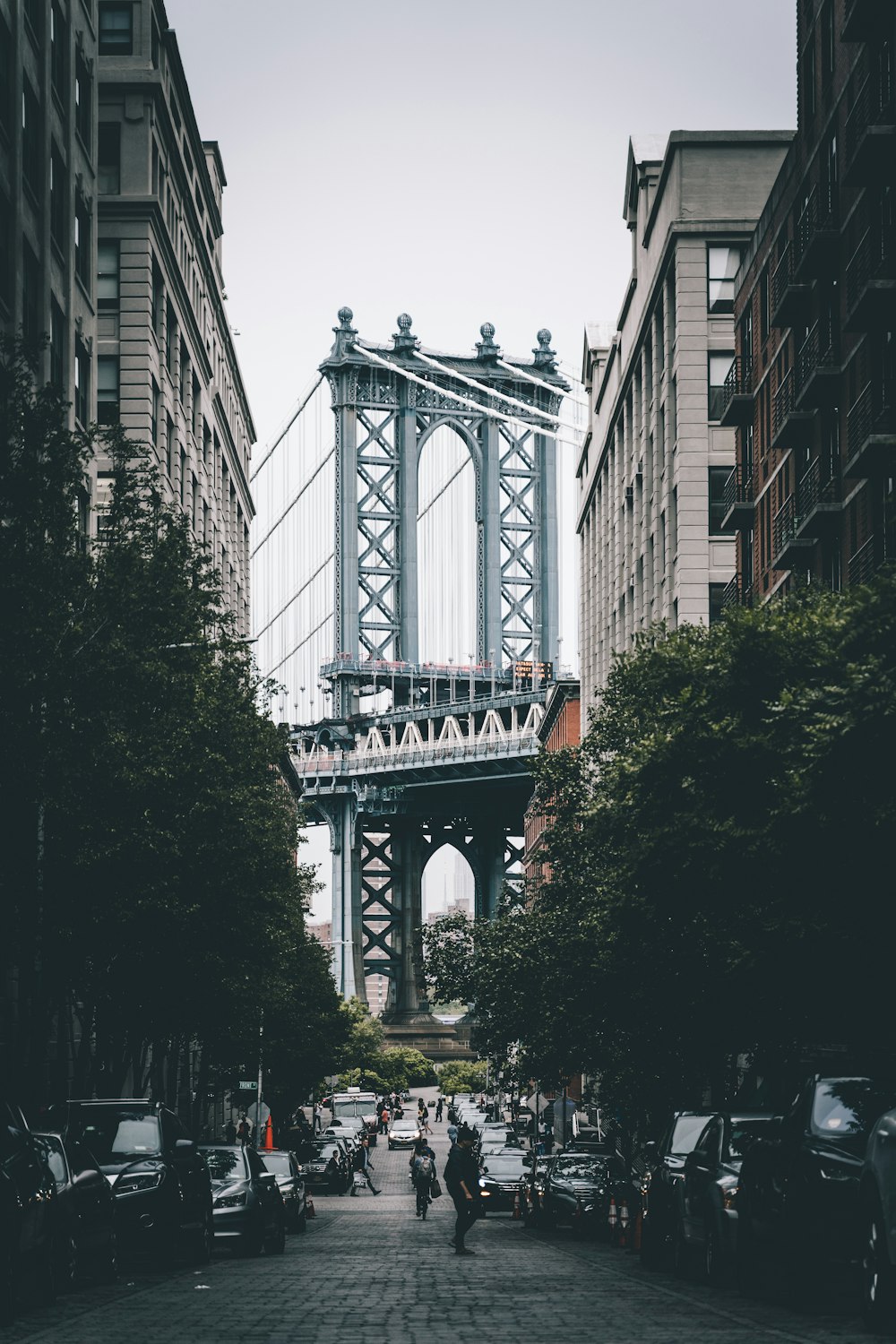 group of people near bridge