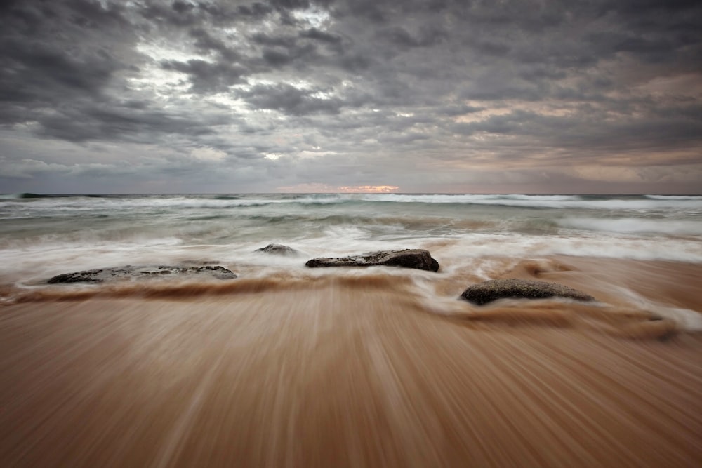 long exposure photography of body of water