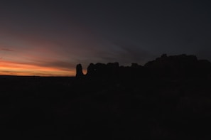 A beautiful sunset backdrop with a rocket launch silhouette.