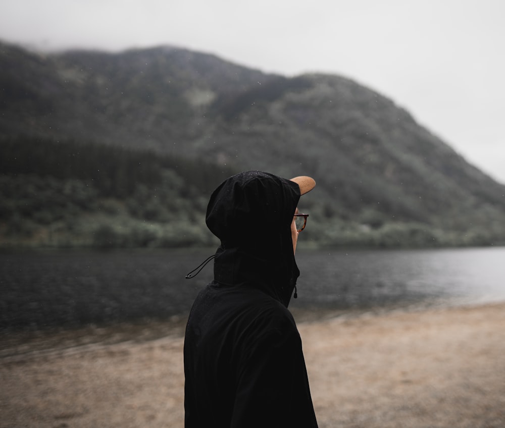 person in black hoodie