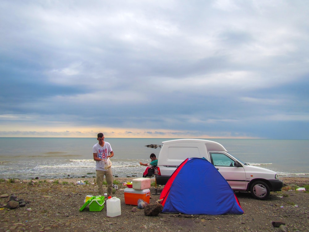 man preparing for the camp near beach