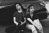 A group of friends sharing music using our bluetooth headphones.