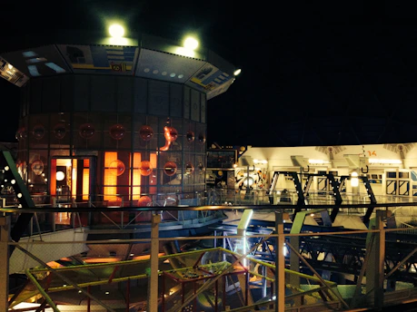 Futuristic command center with holographic displays and a dark, cyber-military HUD ambiance.