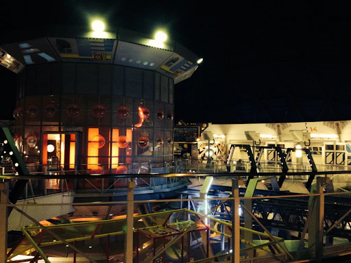 Futuristic neon-lit workspace with holographic interface and dark tech ambiance.