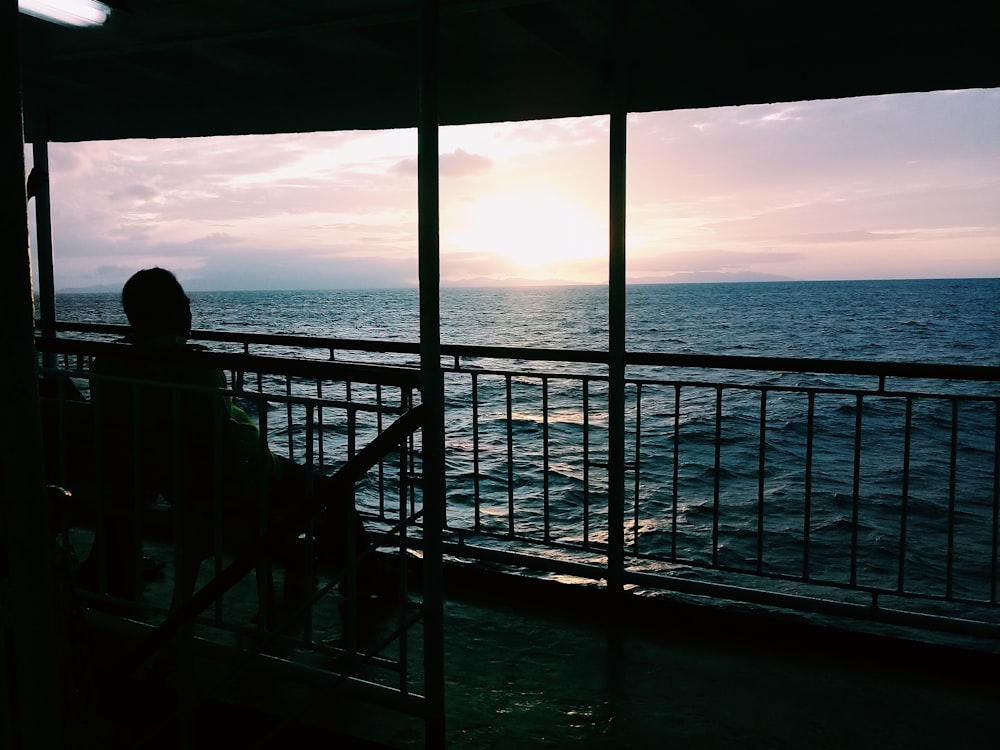 silhouette of sitting man