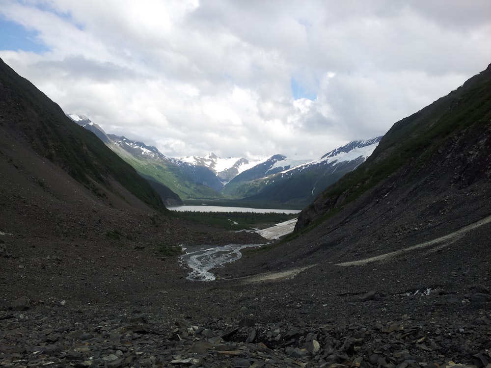 landscape photo of black and green mountains