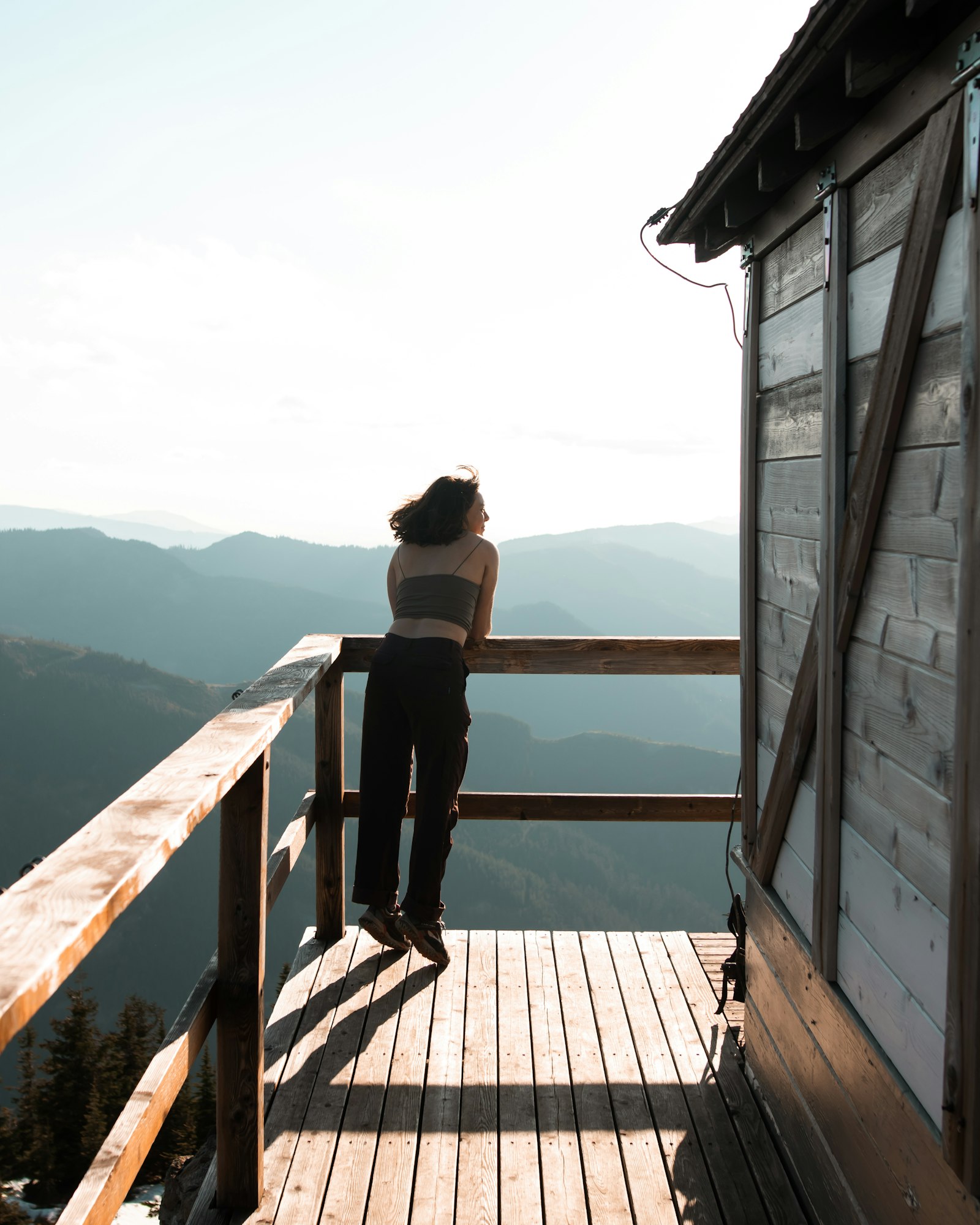 Sigma 24mm F1.4 DG HSM Art sample photo. Woman leaning on rail photography