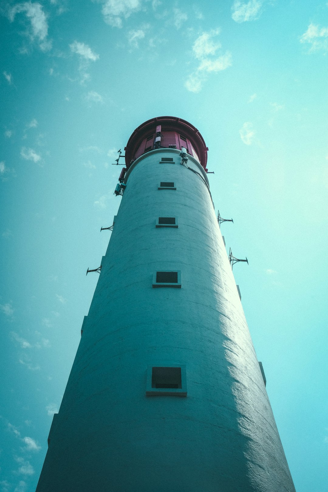 worm's eye view photography of lighthouse