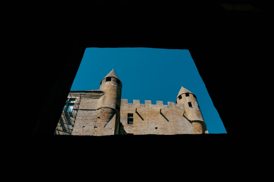 gray concrete castle under blue sky