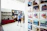 A vibrant, modern gallery wall displaying rotating colorful promotional images.