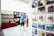 A close-up shot of a vibrant, detailed artwork displayed in a cozy gallery setting.