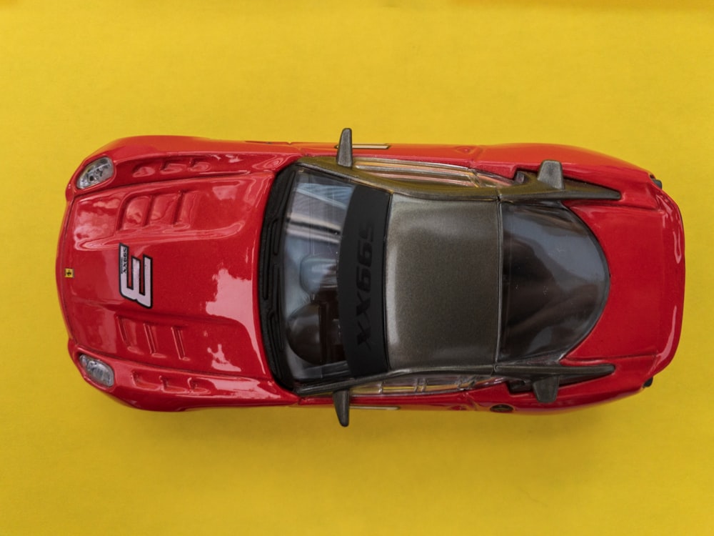 red and black vehicle toy