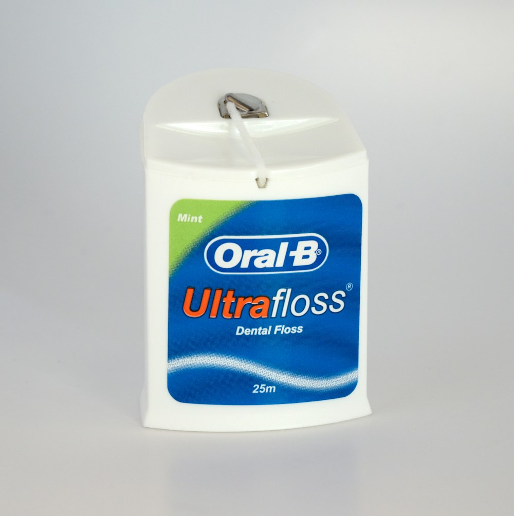 Oral-B Ultra floss dental floss container photo – Free Cosmetics Image on  Unsplash