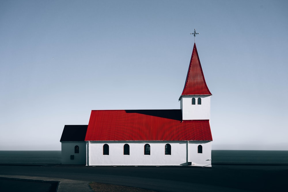 red roofed white concrete church illustration
