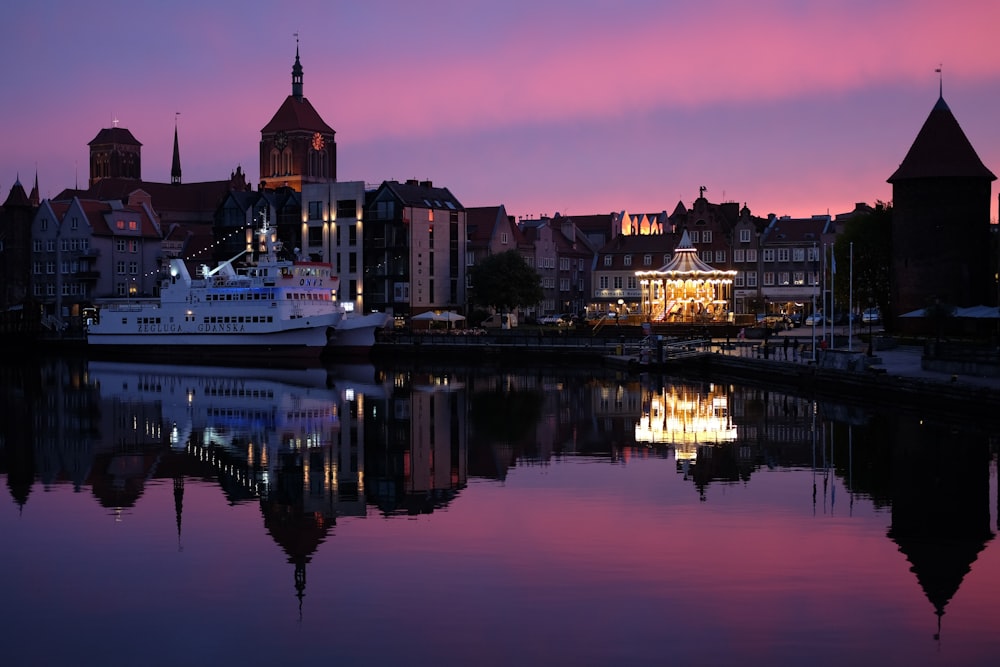 panoramic photo of buildings facing body of water