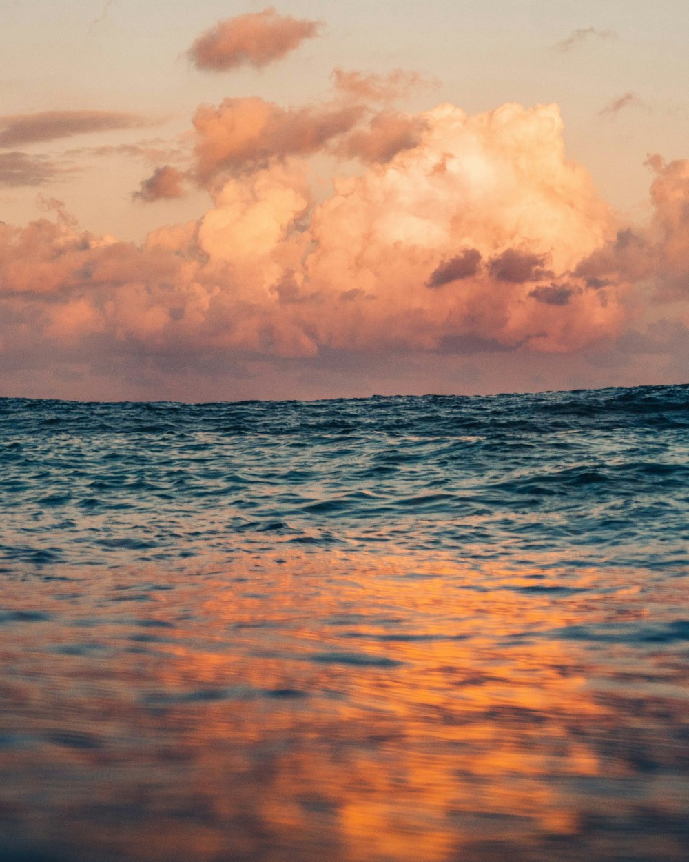 calm waters at the sea during daytime