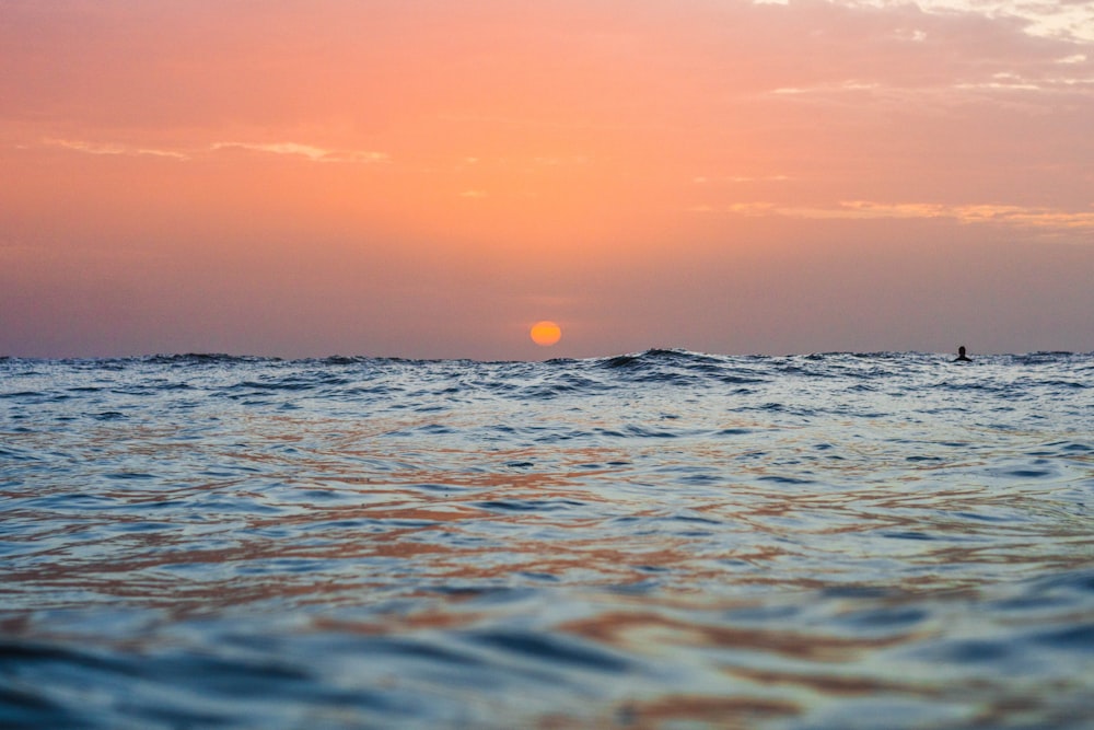 seawaves during golden hour
