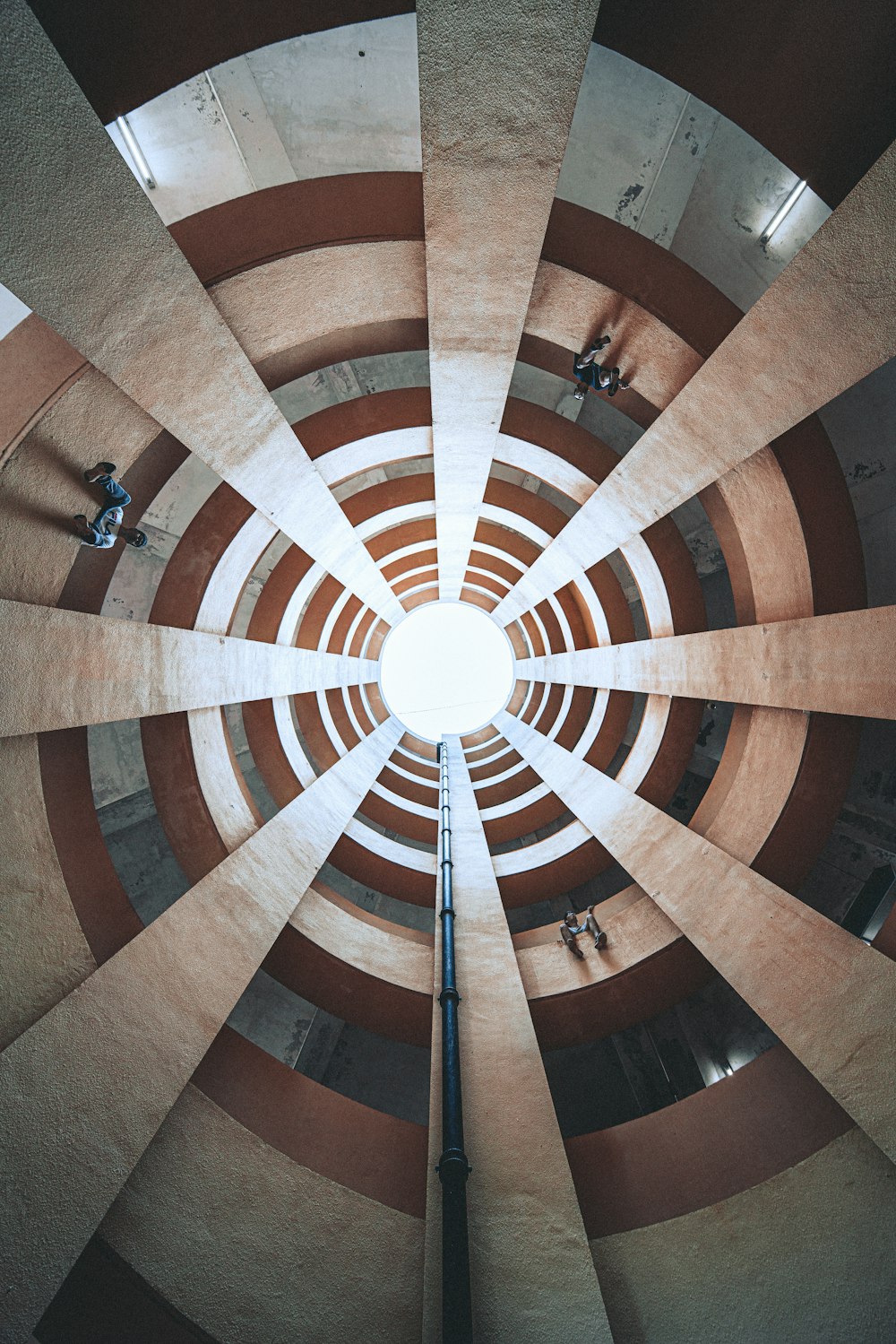 spiral view of people inside building