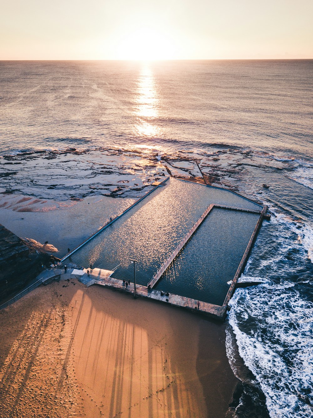 aerial photo of seashore during sunrise