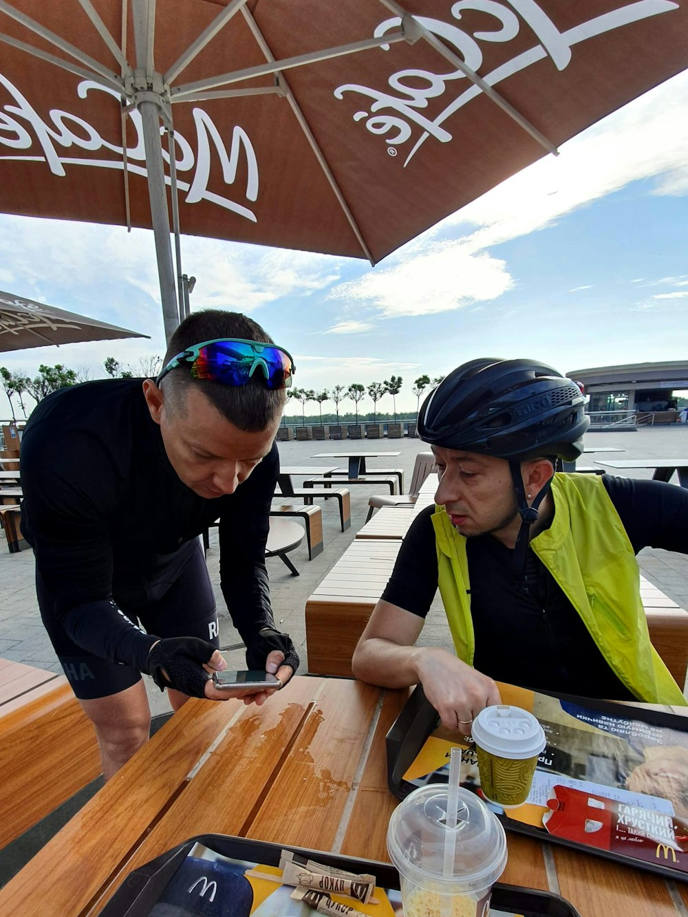 two men eating Mcdonald's