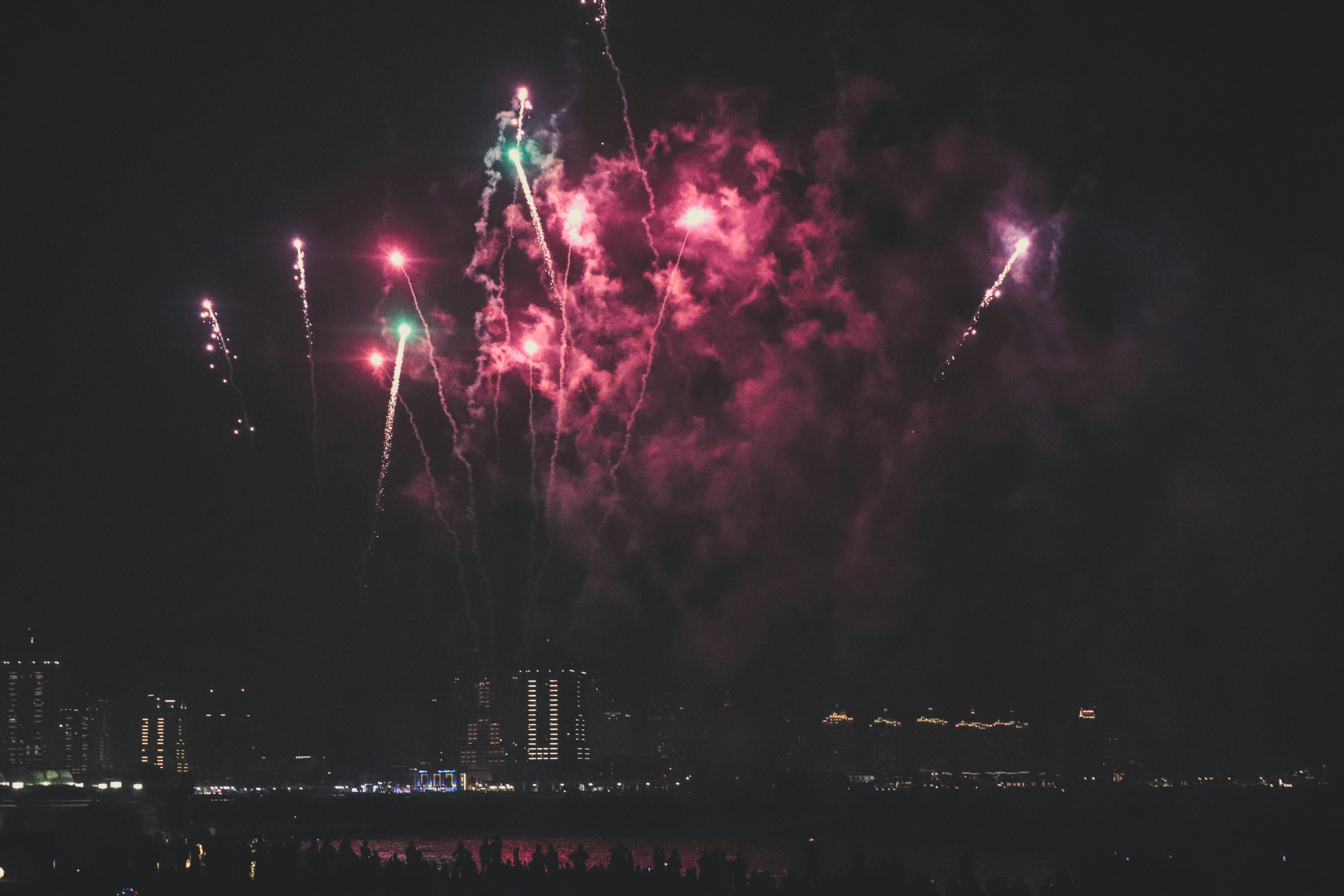 firework display during nighttime eid teams background