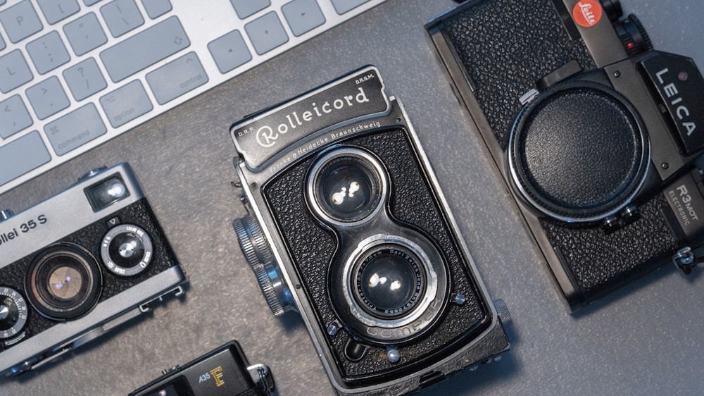 flat lay photography of cameras
