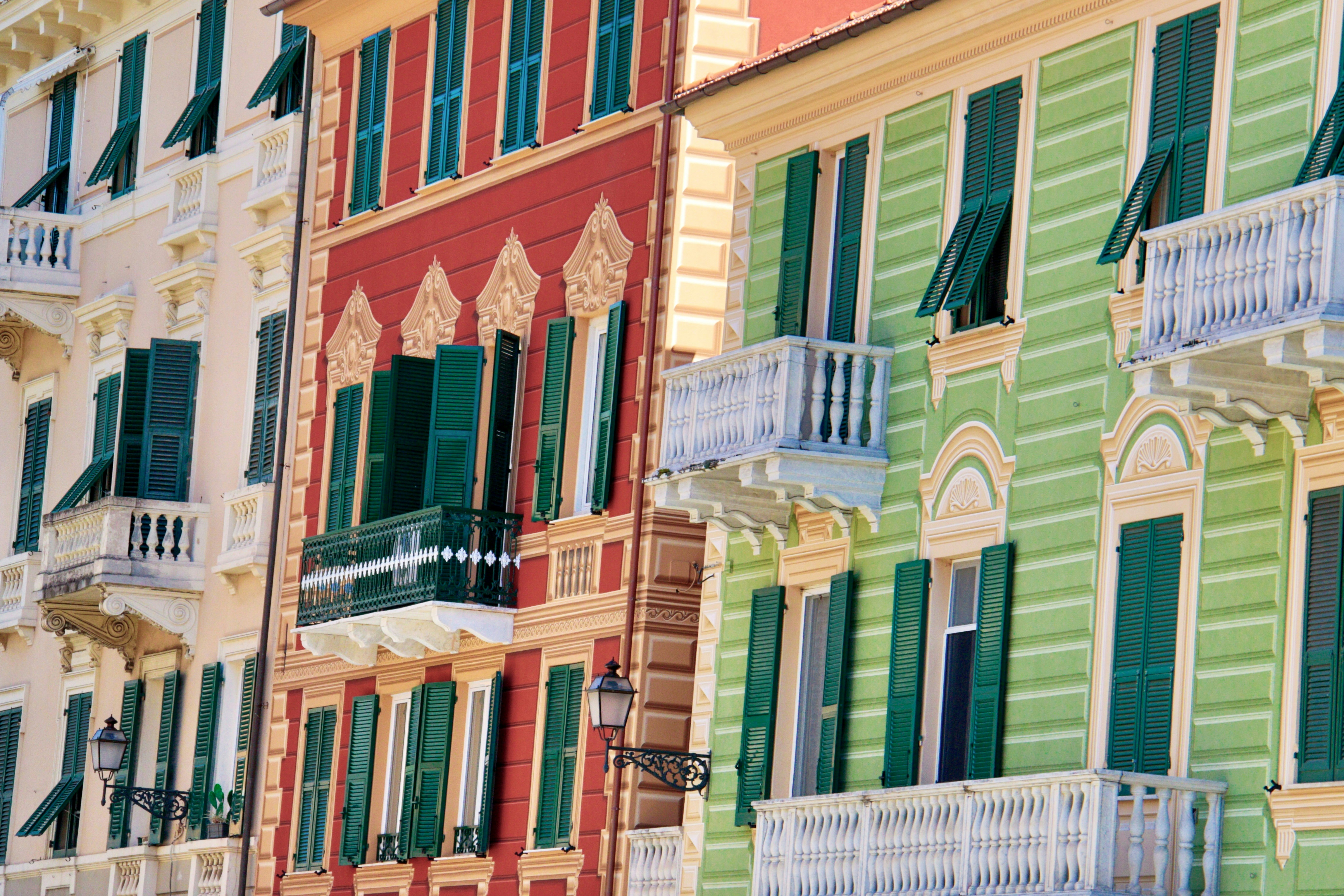 red, green, and beige buildings during daytime