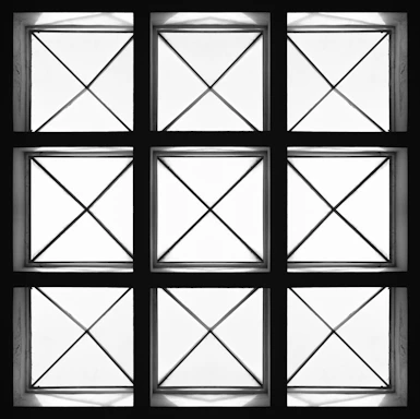 A clean, minimalistic six-grid layout with light grey borders framing each content box.