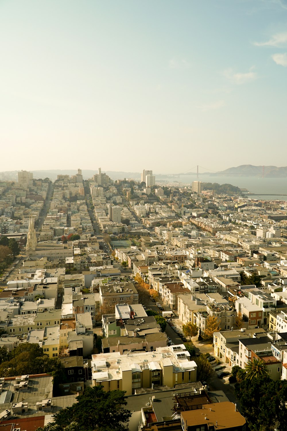 aerial view of buildings under white sky