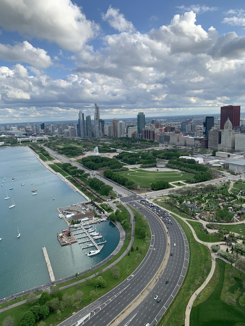 aerial view of building and vehicle on roads