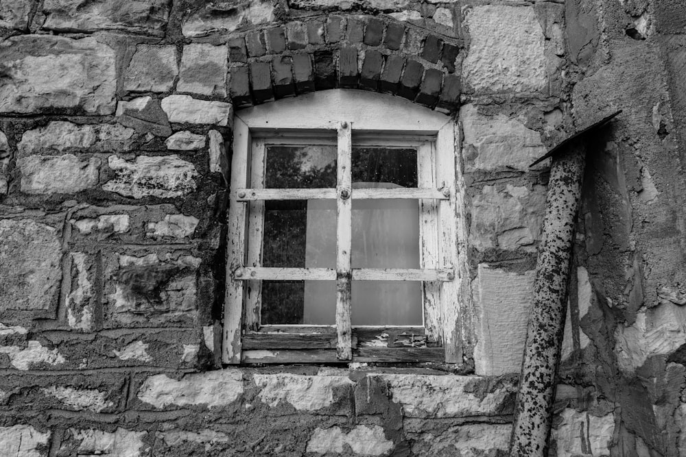 greyscale photography of window